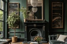 28 a moody living room with dark green walls, a black fireplace, a dark green sofa, a coffee table and a brown daybed