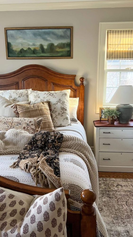Printed textiles make this neutral bedroom more eye catchy and more welcoming adding a cozy feel