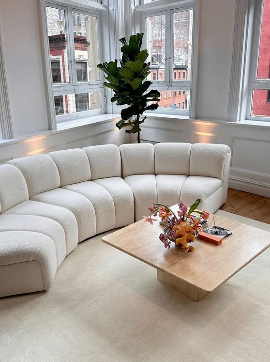 a curved modular sofa in boucle is a gorgeous idea as it includes three trends - curves, flexibility and boucle