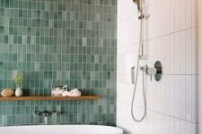 43 a bold contemproary bathroom with skinny white and mismatching green skinny tiles plus a grey mosaic tile floor