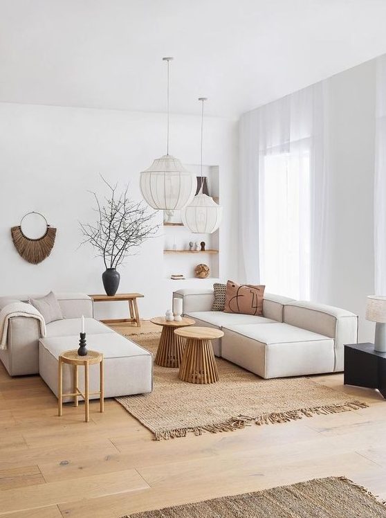 a modular white sofa composed of two parts can be used separately as two smaller sofas or daybeds