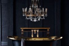 a luxurious vintage bathtub in black and gold is a stunning idea for every bathroom