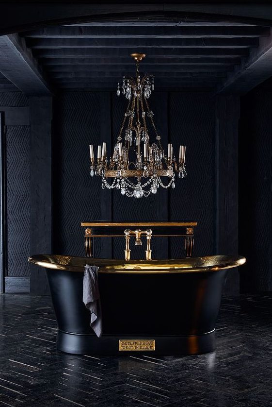 a luxurious vintage bathtub in black and gold is a stunning idea for every bathroom