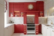 a refined kitchen with white and red cabinets, white marble surfaces and gold handles plus a tile floor just wows
