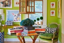 a super bold chartreuse room with a colorful extended gallery all, a glass table, a chartreuse chair and a lantern
