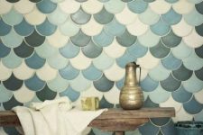 cream, blue, light blue and graphite grey fishscale tiles for an accent bathroom wall in soft ocean colors