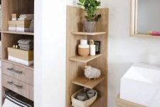 a comfortable wooden shelving unit with a base is ideal for a contemporary or minimalist bathroom