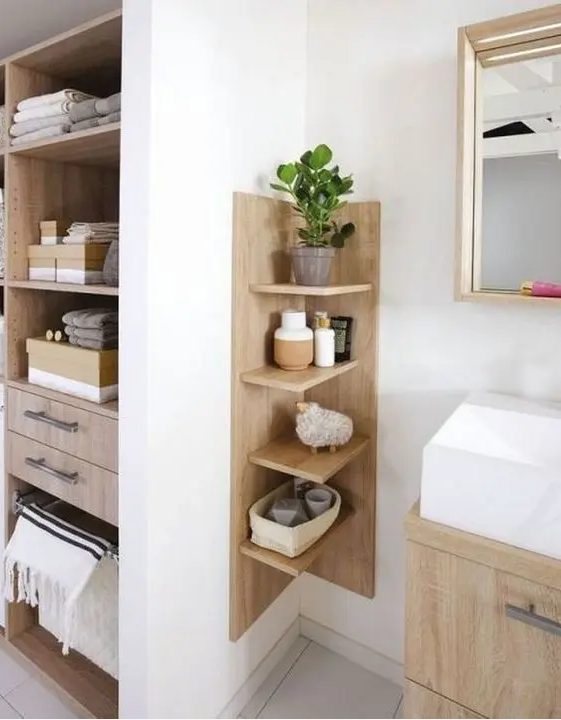 a comfortable wooden shelving unit with a base is ideal for a contemporary or minimalist bathroom