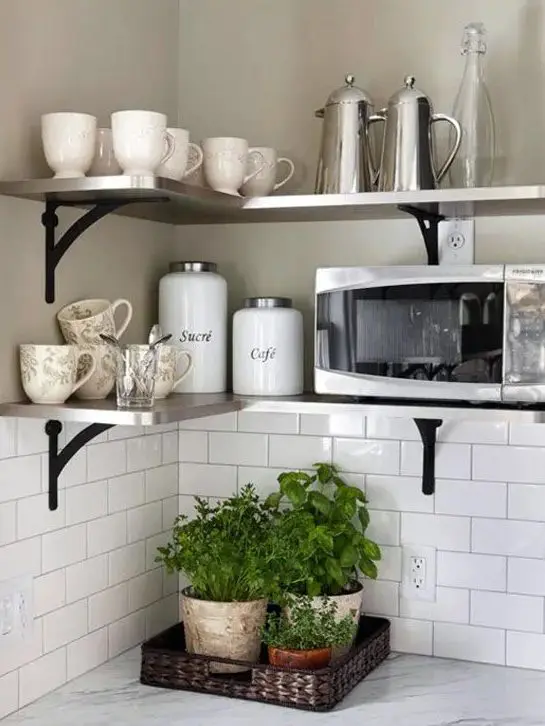 a couple of metal corner shelves will save much space in your kitchen and will make it comfier