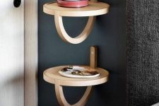 a creative nightstand formed of two round shelves is a cool idea for a small bedroom, it looks eye-catchy and adds to the decor