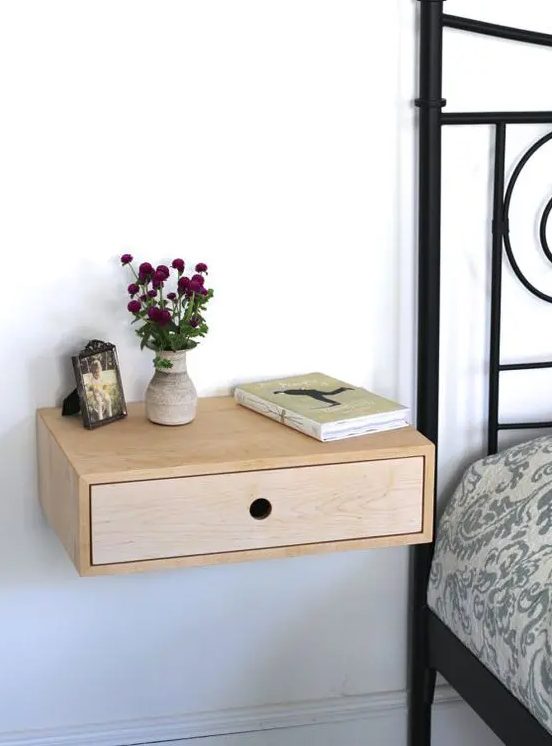 a cute wooden nightstand with a drawer is a great solution for many spaces, not only for bedrooms