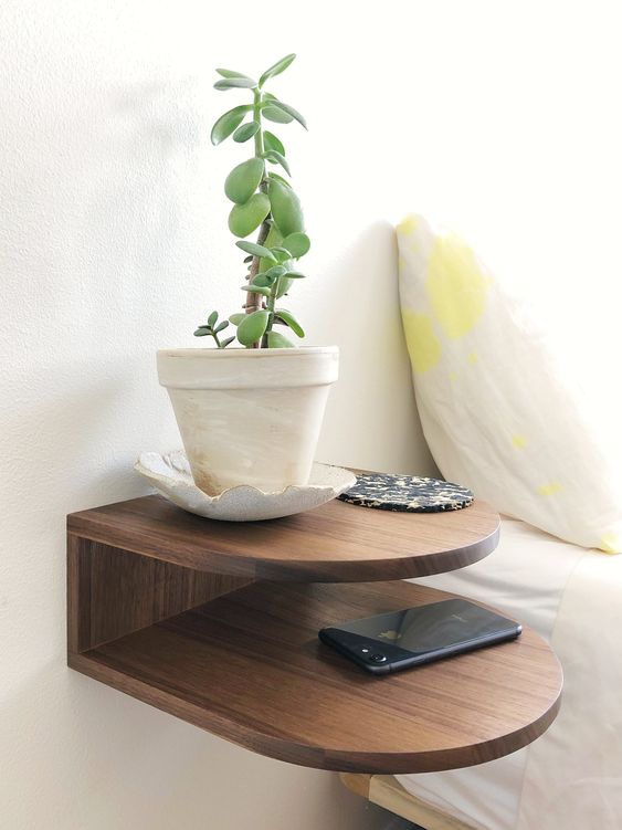 a floating walnut nightstand is a stylish solution for a modern or contemporary space, if it seems you have no space for a nightstand