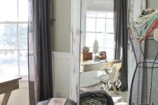 a large mirror in a shabby chic frame will be a fit for a vintage or rustic space