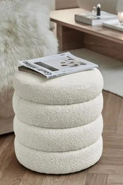 a lovely neutral boucle ottoman is a cool solution for many contemporary spaces