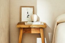 a small stained nightstand in vintage style is a cool idea for a modern farmhouse bedroom, its design is timeless