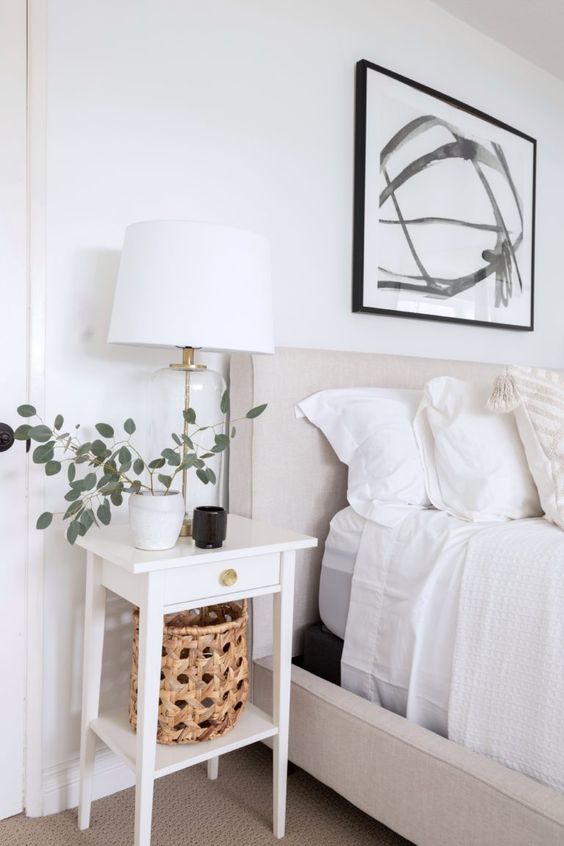 a small white nightstand with a single drawer is a lovely idea for a mid-century modern or farmhouse space