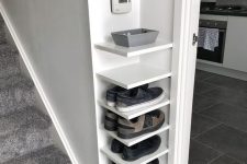 comfortable corner shelves for storing shoes in a tiny entryway are perfect and can be DIYed fast