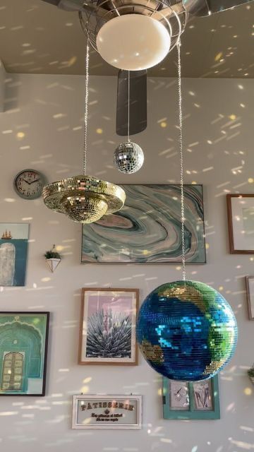 disco balls shaped as solar system planets are fun and cool, they will bring light and much interest to the space at the same time