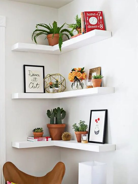 make a trio of corner shelves to decorate an awkward corner and make maximum of it