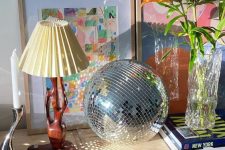 place a disco ball on a credenza opoosite the window, and it will reflect sunshine and fill your space with it