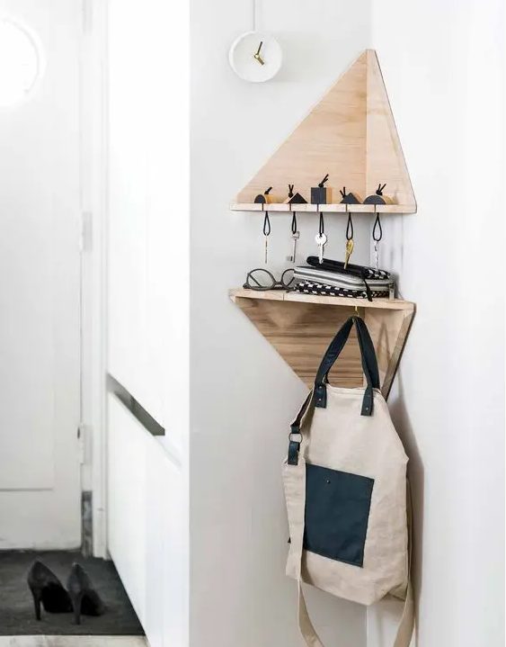 small triangle shelves for keys and for hanging bags and backpacks are ideal for entryway