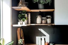stained corner wall-mounted shelves with potted plants, jars with various stuff and teaware are a cool idea