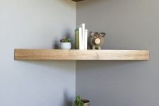 stylish thick triangle-shaped wooden shelves with a shiny edge look very chic and stylish