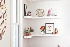 white corner shelves with bright decor, potted plants, books, vases and candleholders are great to style a room