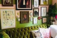 a bold maximalist living room with green walls and furniture, a gallery wall with bright artworks and potted plants