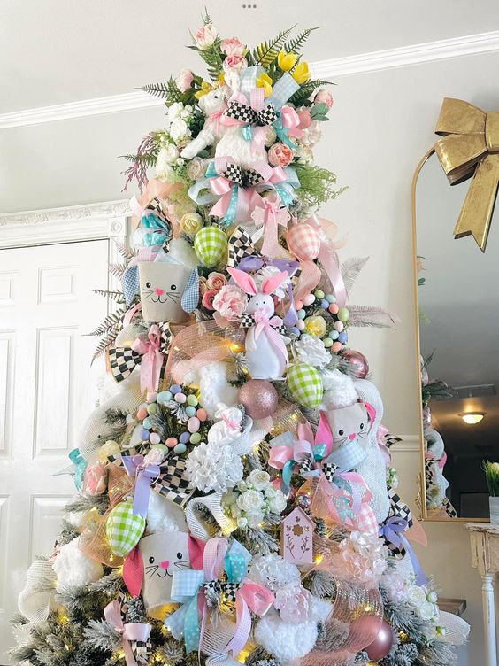 a bright Easter tree with bunnies, beads, eggs, bows, ribbons and faux blooms and leaves is a cool idea for the spring holidays