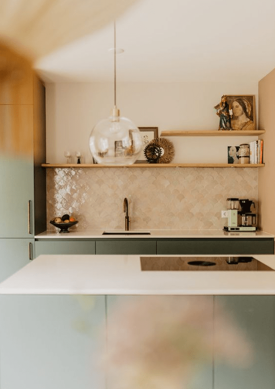 a lovely green and brown kitchen design