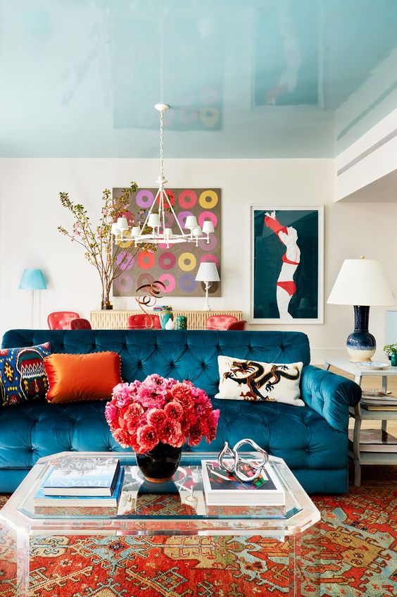 a cute, colorful living room design with lots of blues