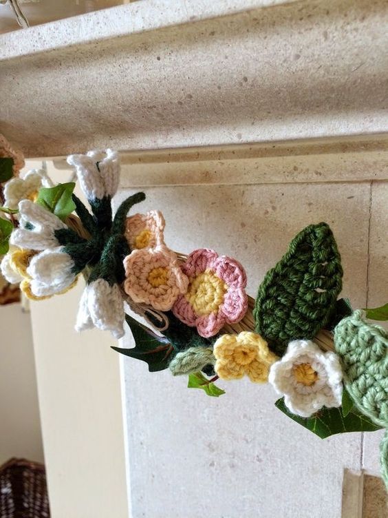 A cool crochet spring flower garland is a cool idea if you love crocheting and cozy grandma inspired decor