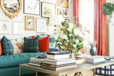a maximalist living room with a bold green sofa and leopard chairs, a gallery wall with bright artworks and colorful curtains