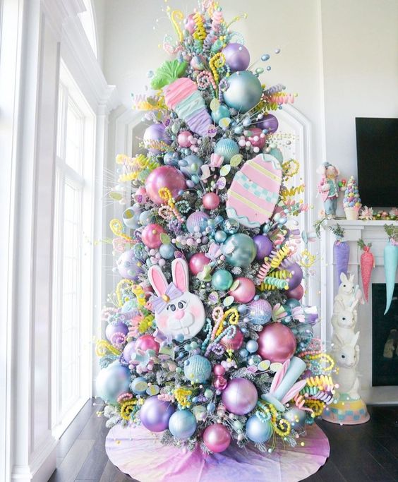 a pastel Easter tree with oversized baubles, bunnies, yarn carrots and eggs plus some beads is amazing
