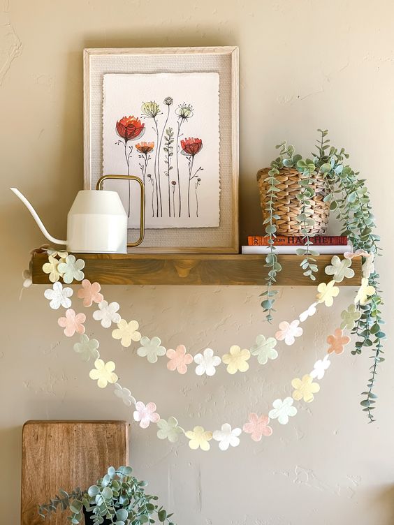 a pastel felt flower garland is a cool idea for spring and Easter, you can make it yourself