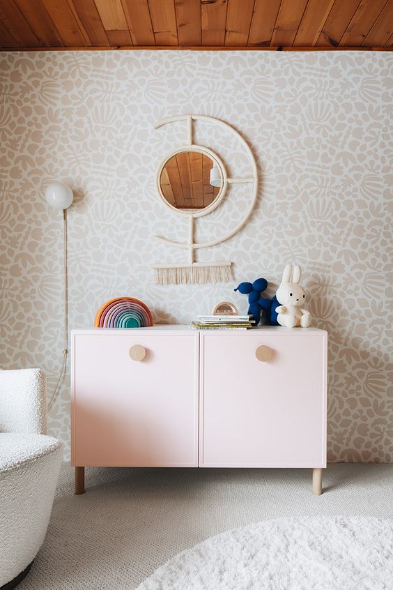 a pink IKEA Metod revamp to get a lovely cabinet for a kid's room, with large knobs, is a super cool and catchy idea