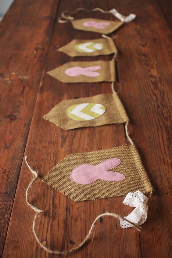 a rustic Easter or spring banner of burlap, with eggs and bunnies is a lovely decoration