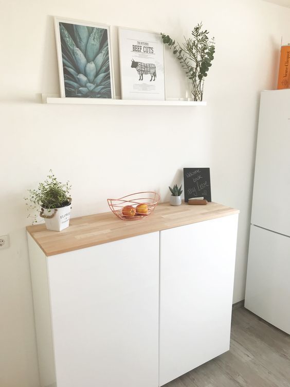 a simple and comfy in using IKEA Metod with a stained countertop is a lovely idea for a modern or Nordic interior