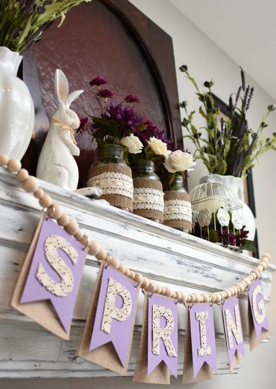 a spring garland of cardboard, letters and wooden beads is a cool decoration for spring