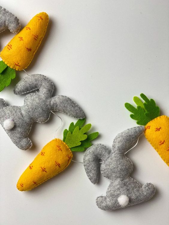 a super cute garland of felt carrots and bunnies is a lovely idea for spring and Easter