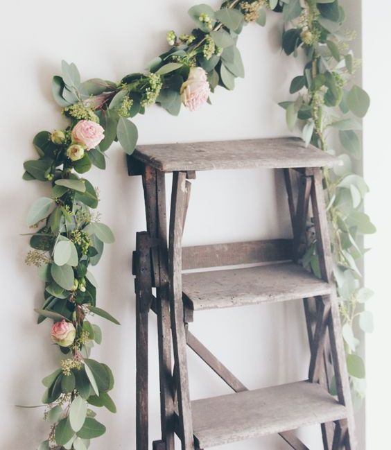 a very natural-looking faux bloom and greenery garland is a lovely idea for spring and summer, it looks very cool and fresh
