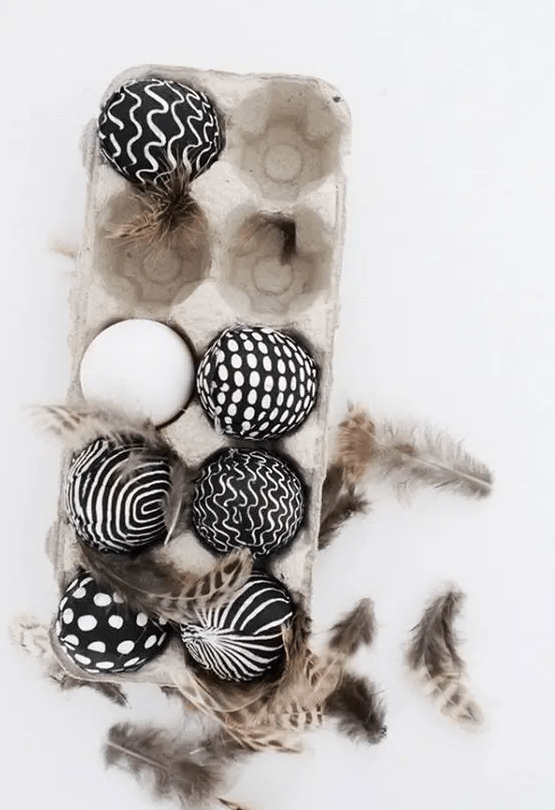 black and white Easter eggs decorated with a sharpie are an easy idea for modern or Scandinavian celebration
