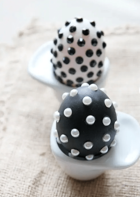 black and white Easter eggs decorated with pearls and black rhinestones are amazing for modenr Easter decor
