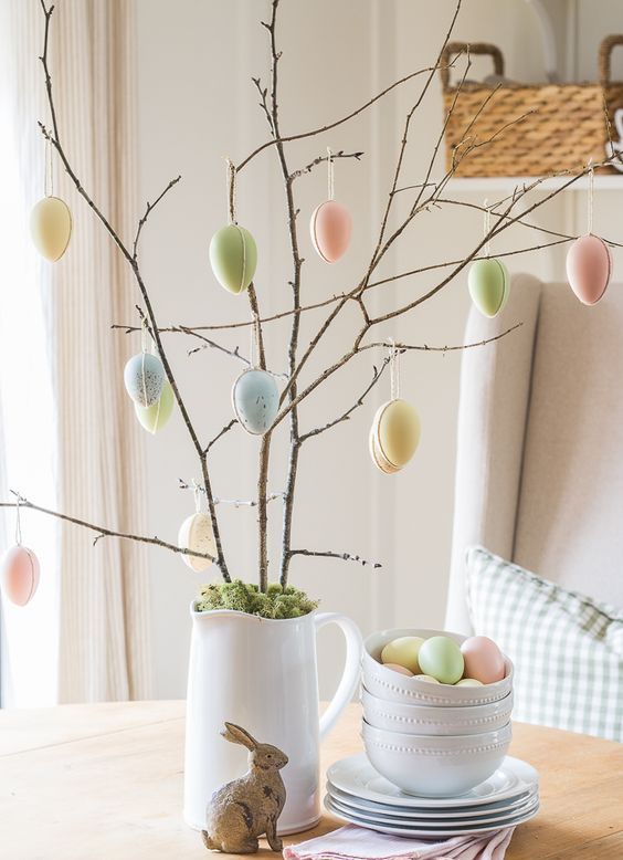 branches with faux pastel eggs are a simple and cool last-minute decoration for spring and Easter