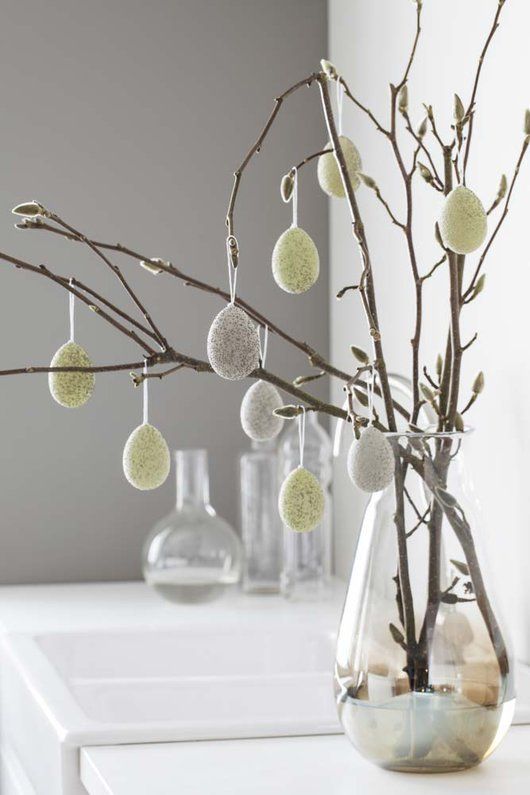 branches with speckled faux eggs are a cool Easter tree or centerpiece, they make up a cool and lovely Easter decoration