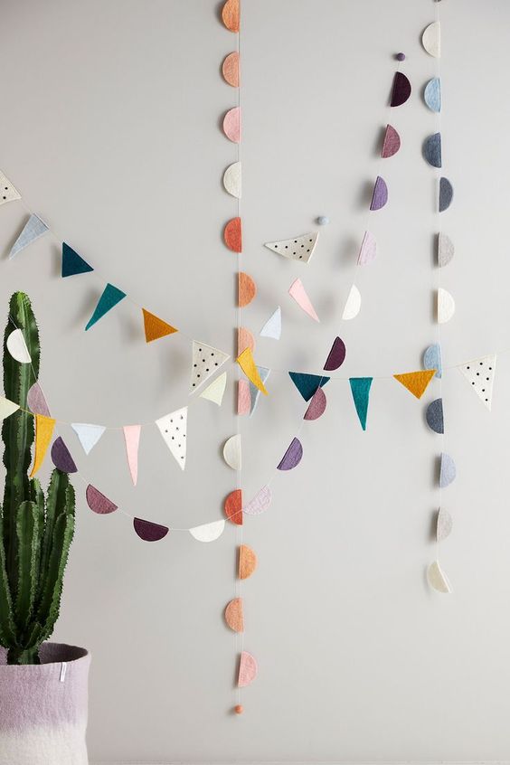 colorful paper garlands are great decorating a space in any season, not only in spring