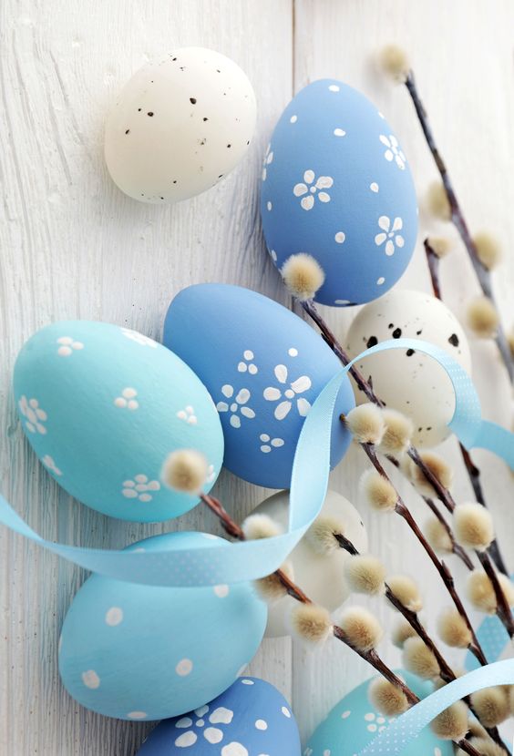 delicate turquoise and blue Easter eggs decorated with white polka dots and flowers are amazing for Easter