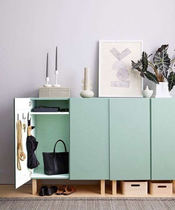 lovely mint green IKEA Metod cabinets on stained legs will be a perfect fit for a Scandinavian space, with a slight touch of color