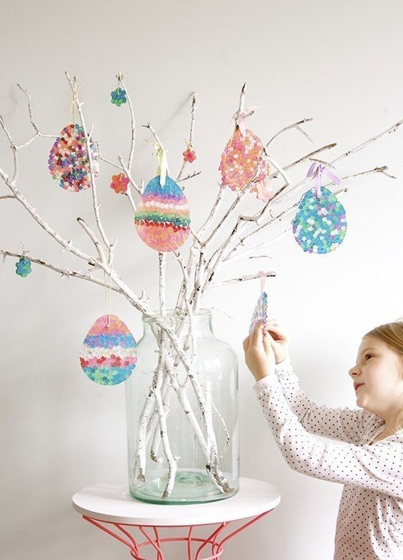 white branches decorated with lovely beaded eggs are a cool craft for Easter and spring, make them with your kids